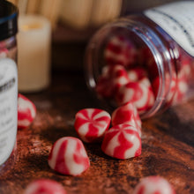 Load image into Gallery viewer, Strawberry jelly sweets spilling out a plastic tub onto a table