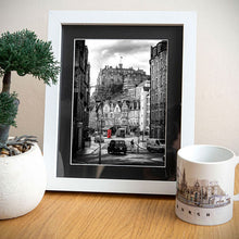 Load image into Gallery viewer, Line drawing of the Grassmarket by Als Couzens on table top