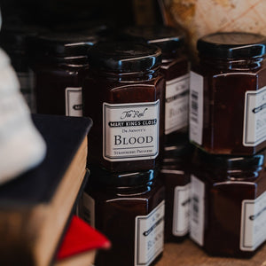 apothecary jar of blood (strawberry preserve) sold in the real mary king's close gift shop