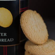 Load image into Gallery viewer, short bread leaning against the real mary kings close tartan tub 
