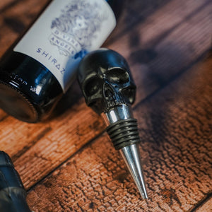 skull bottle top for wine beside a bottle of shiraz sold at The Real Mary King's Close