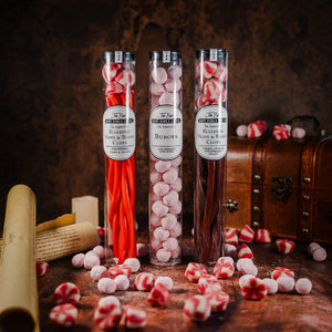 Three 17th century medical themed sweets tubes at The Real Mary King's Close