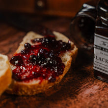 Load image into Gallery viewer, Blackcurrant jam on crusty bread
