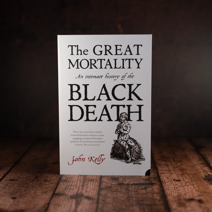 The Great Mortality by John Kelly book cover displayed on a wooden slatted table